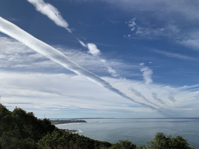 What caused the 300km roll cloud over NSW today?